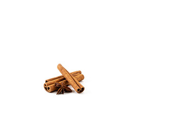 Anise star and cinnamon sticks isolated on a white background