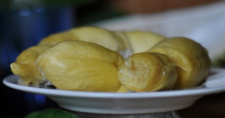 Durian fruit flesh on a white plate
