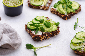 Toasts with avocado and microgreen