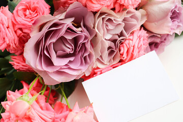 mockup greeting card. large bouquet of roses and space for text 