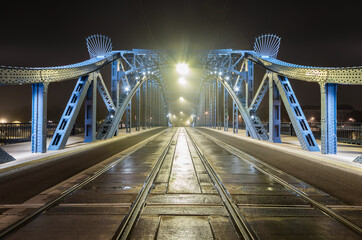 Krakow Poland, Pilsudski bridge over Vistula river in the night