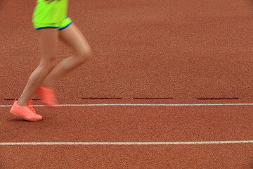 Fototapeta premium Long distance runners are running on the track