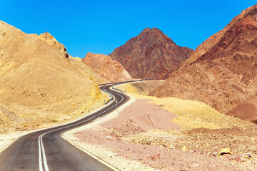 The highway runs through the Eilat Mountains