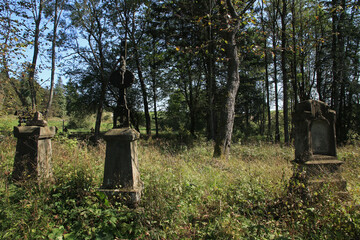 Old cemetery in abandoned village Lupkow in Bieszczady Mountains, Poland