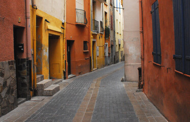 Fototapeta na wymiar France- Collioure- A Colorful Narrow Street in the Medieval Center