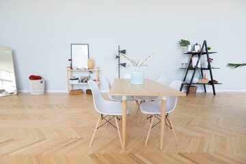 The interior design of the studio apartment in Scandinavian style. A spacious huge room in light colors. stylish expensive luxury furniture.