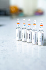 COVID-19 vaccine vials, doses. A coronavirus vaccination point.