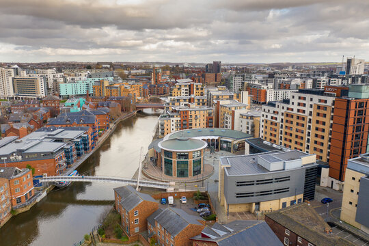 Aerial photo of the area in the Leeds City Centre known as Brewery Wharf on a beautiful sunny summers day showing buildings by the Leeds and Liverpool canal with building on the canal bank