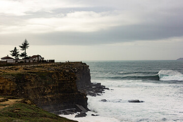 Wave breaking near a cliff during the winter in the coast of Portugal