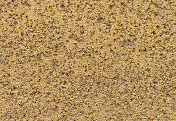 Sand colored artificial sandstone texture