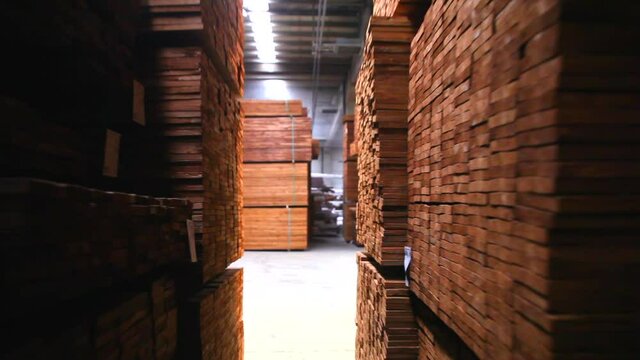 Production process in a furniture factory, woodworking machine mechanism close up. Workflow in a furniture factory. Woodworking factory