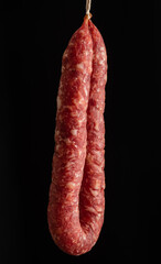 homemade pork sausage on the black background