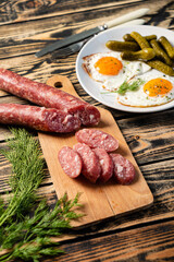 breakfast with egg, sausage and beans