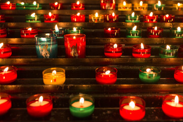 Candles at Eglise Saint-Pierre, church at Mont-Saint-Michel, France.