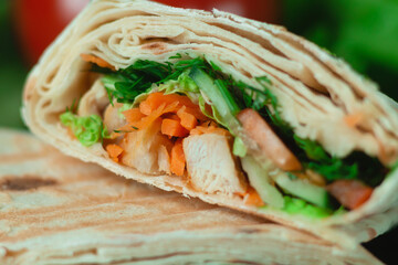 Homemade diet fresh shawarma with greens, chicken breast and tomatoes