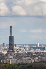 The Eiffel Tower is visible against the backdrop of the Montparnasse tower. Paris. France - 410008319