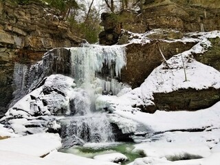Fototapeta na wymiar winter waterfall in the mountains