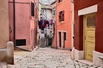Rovinj, Istria, Croatia: picturesque old alley with ancient houses in the medieval town