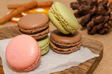 Stack of macaroons, rustic background 