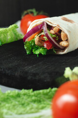 Homemade diet fresh shawarma with greens, chicken breast and tomatoes