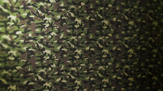 Green camouflage pattern background. Military uniform concept. Abstract line and wave texture. Loop animation.