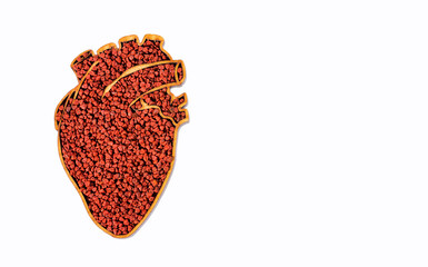 Bixa Orellana seeds in heart shaped bowl