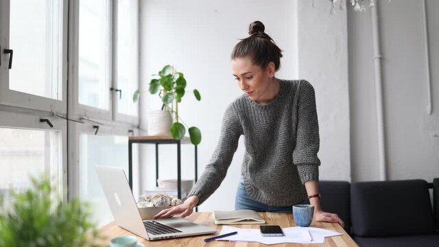 Young adult female professional working in a modern office
