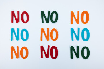 A banner with repeating word YES in different colors: red, blue, orange, and green