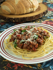 Pasta in Meat Sauce with Bread Vertical