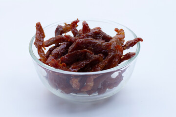 Deep fried sun-dried pork on white