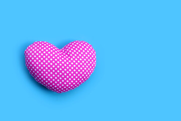 Valentine's heart on blue background.