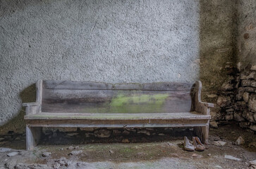 Bench in front of a wall