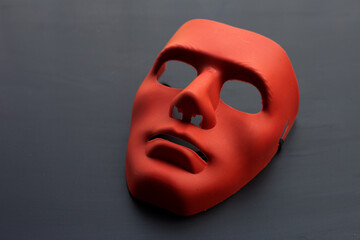 Face mask on dark background.