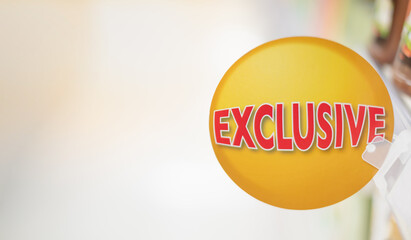 Exclusive sign on shelves in supermarket  for promotion and special price offer to customer, Sale discount text display on the red poster.