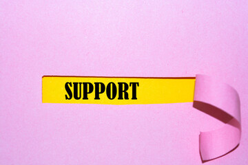 Support word written under torn paper