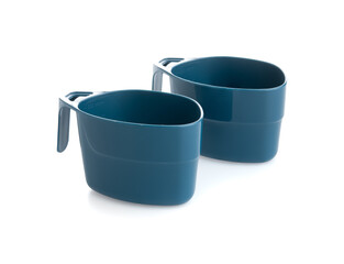 Blue plastic mug on a white background
