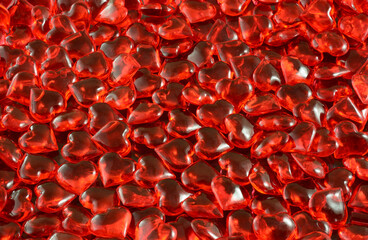 Closeup of red acrylic hearts for Valentine's or romantic love background
