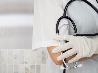 hospital clinic lab or laboratory doctor nurse scientist wear uniform hold hand stethoscope diagnose treatment healthcare therapy surgery patient ill sickness covid-19 rsv corona virus disease medical