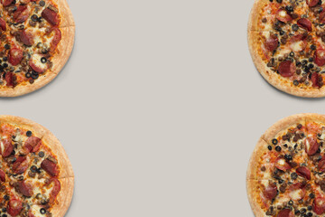 The pizzas are delicious and the ingredients are sausage, bacon and mozzarella on a brown background. can be made of backgrounds, flyers and other forms of advertising,