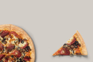 Delicious pizza and ingredients of sausage, bacon and mozzarella on a grey background. with full pizza and slices, you can make backgrounds, flyers and other forms of advertising,