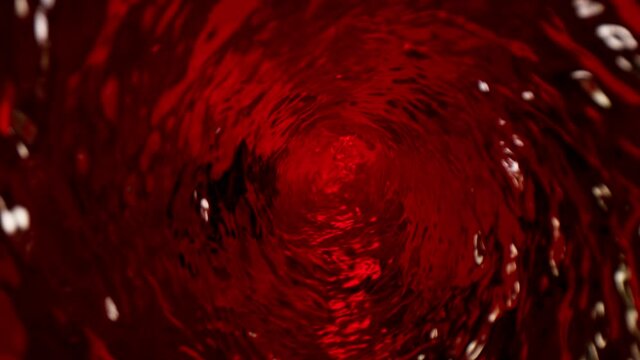 Super slow motion of rotating red wine with camera motion. Filmed on high speed cinema camera, 1000 fps.