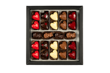 Heart shaped chocolate and love word isolated on the white background. Love or valentine's day concept. Gift for lover. Belgian chocolate.