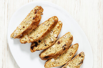 Traditional Italian almond biscotti cookies close up. Homemade sweet cantuccini, dry biscuits baked in oven.