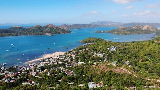 View of Coron Town and Bay from Mount Tapyas on Busuanga Island at sunset - tropical destination with paradise landscape scenery, Palawan, Philippines