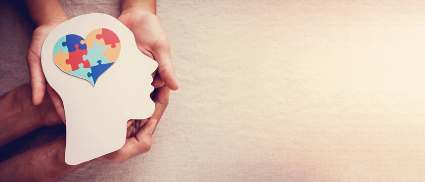 puzzle jigsaw heart on brain,  mental health, Autism disorder awareness, Autism spectrum family support concept, World Autism Awareness Day