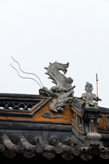 Exquisite sculptures on eaves, Chenxiang Pavilion, Shanghai, China