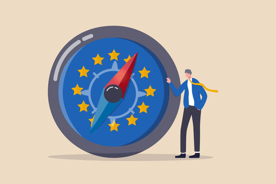 European Union Economic Direction After Brexit And COVID-19, EU Financial Strategy Or Business And Stock Market Outlook Concept, Businessman Leader Standing With Direction Compass With Euro Zone Flag.