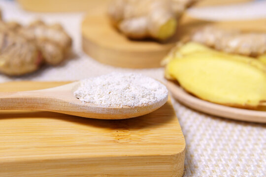 Ginger, whole flour and sliced on Zingiber officinale. Close-up, selective focus