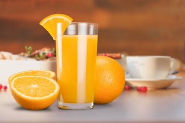 Orange juice in glass and slices of orange fruit © BillionPhotos.com