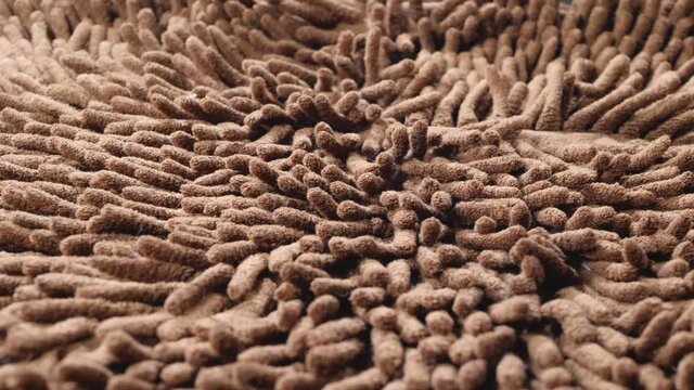 Brown micro fiber soft carpet. True macro close up, domestic texture. High absorbent fabric